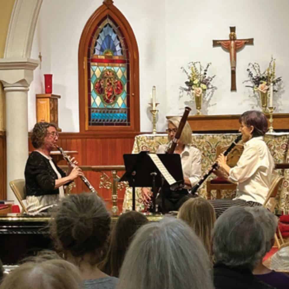 Some musicians perform in a church