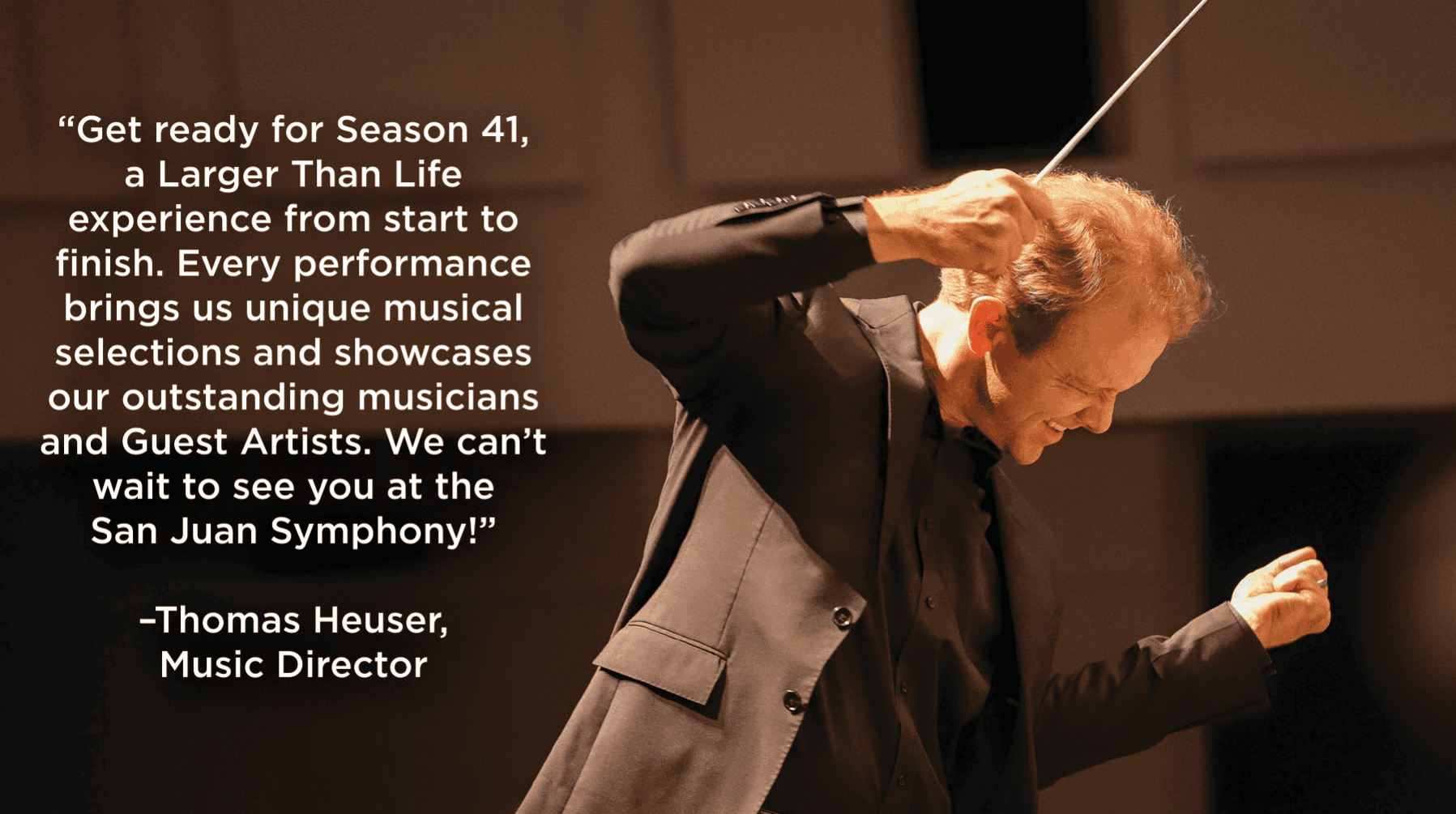 Conductor on stage, baton raised, smiling beside a large overlaid quote about Season 41 and the San Juan Symphony; Music Director.